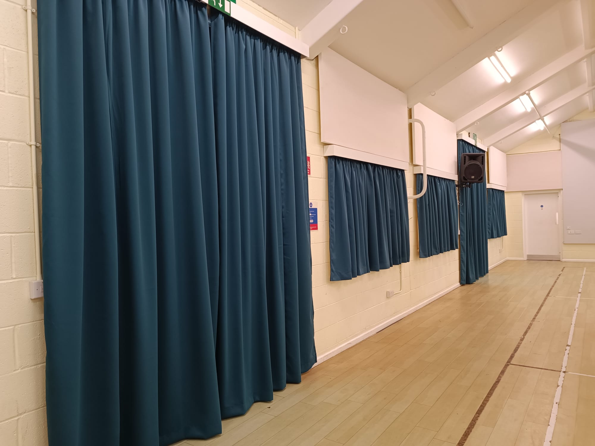 Hall curtains Yelvertoft Village Hall favicon with white initials on blue background